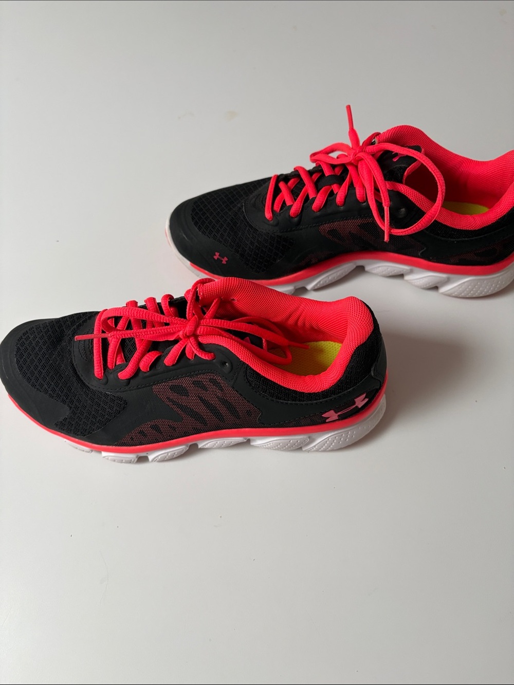 Under Armour Women’s Black and Neon Pink Athletic Sneakers